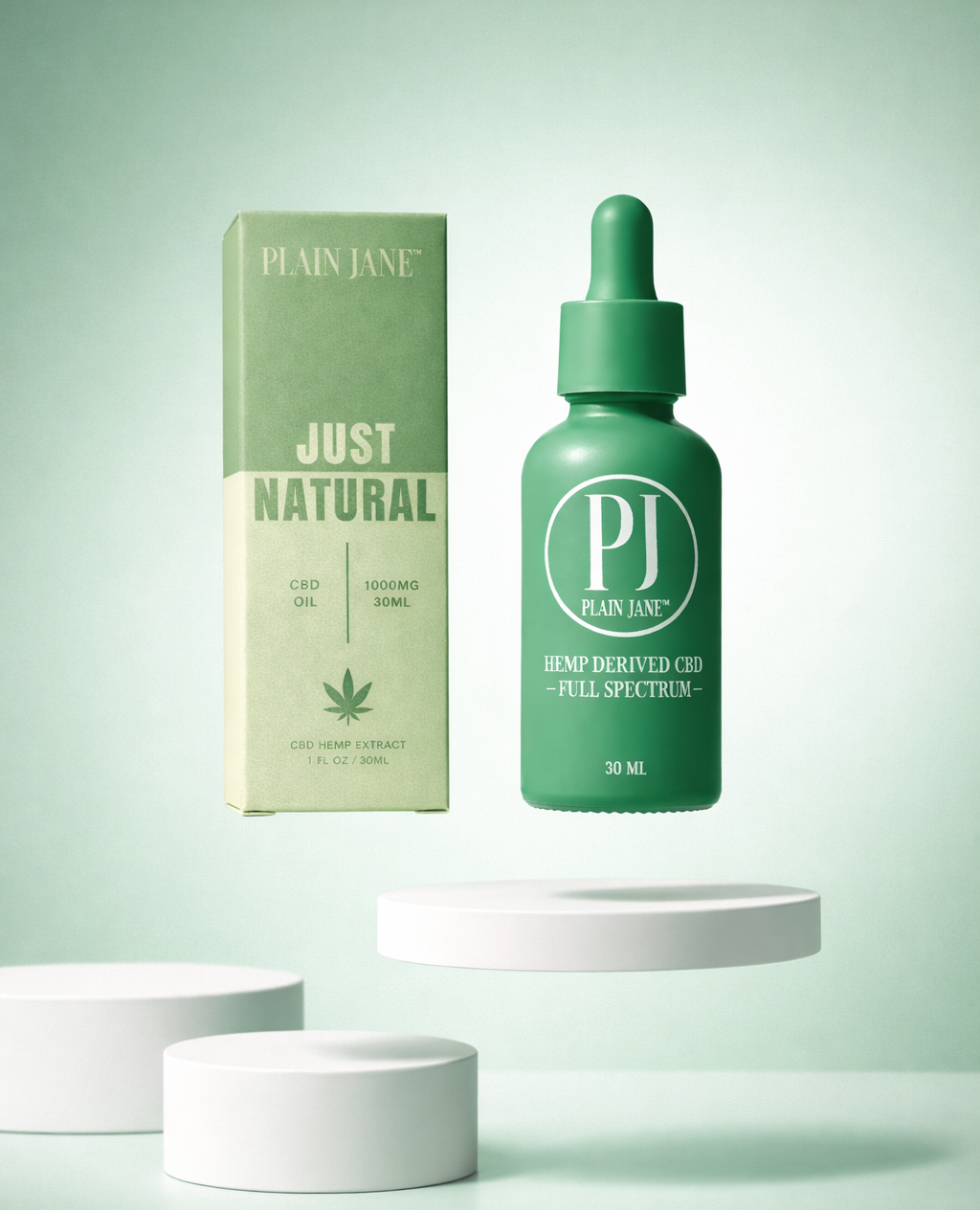 Full Spectrum CBD oil bottle and box with green background