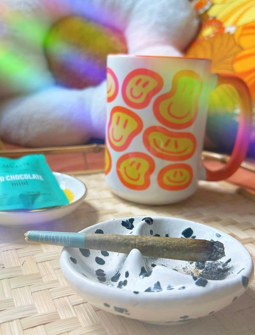 Bright coffee cup and ashtray color story