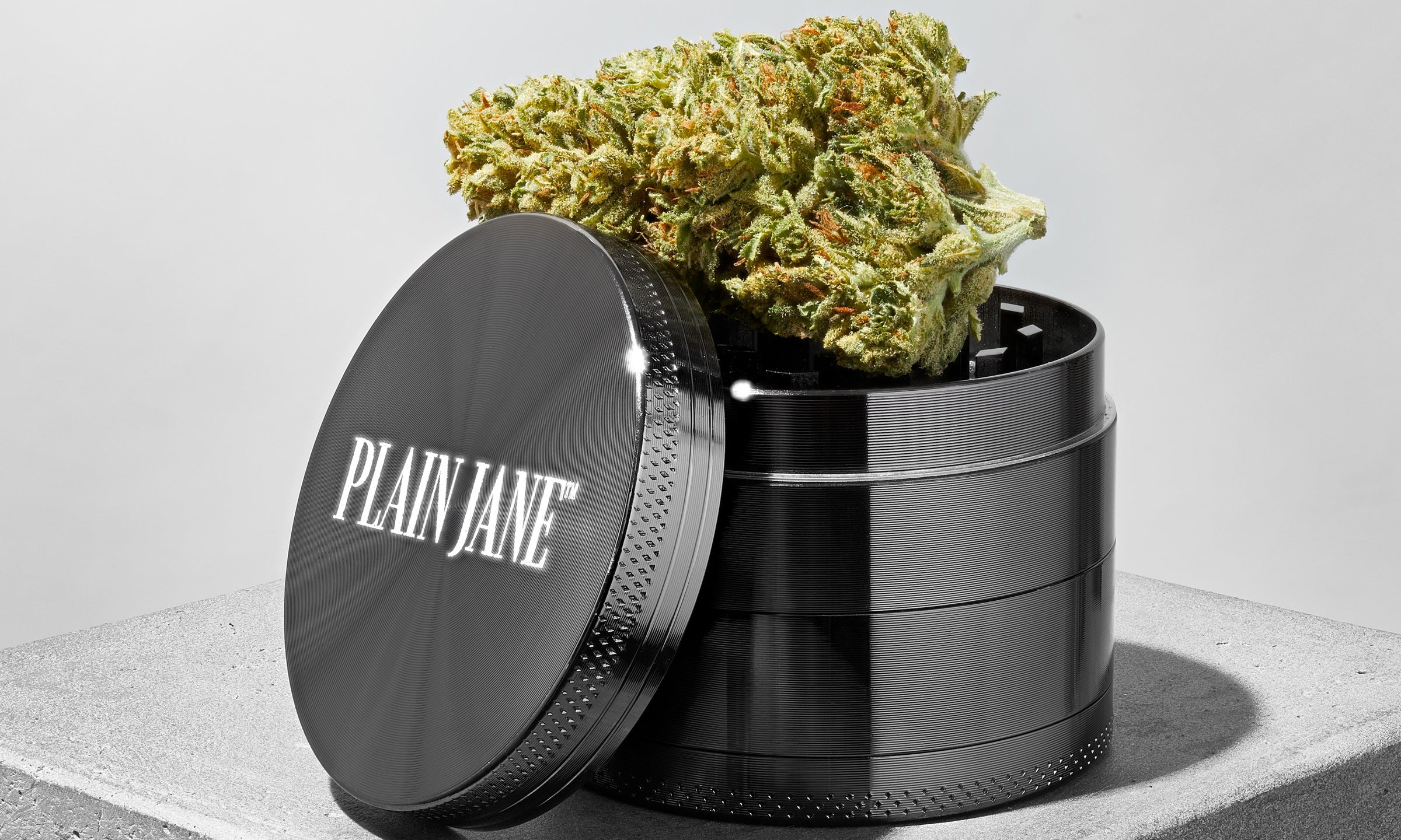 Plain Jane grinder with fresh cannabis flower